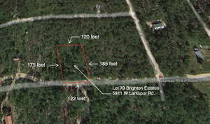 Aerial map of property and surrounding area featuring property parcel outlined