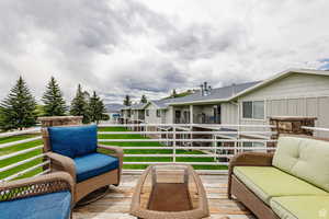 Deck featuring outdoor lounge area