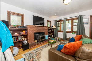 Upstairs living room with cozy fireplace