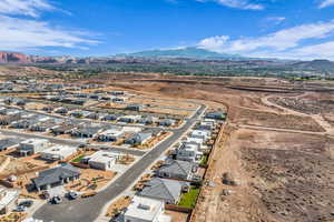 Aerial view of residential area featuring a mountain backdrop