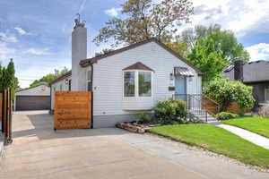 Bungalow with a chimney,  and a 2 garage