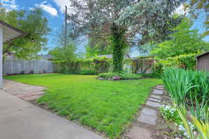 View of yard featuring beautiful landscape