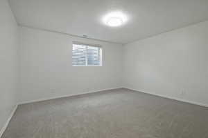 Bedroom # 4 featuring carpet floors