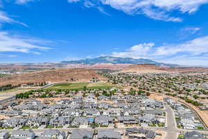Aerial perspective of suburban area featuring mountains