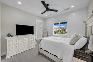 Bedroom with carpet floors, recessed lighting, and a ceiling fan