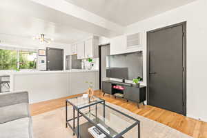 Living room featuring hardwood flooring