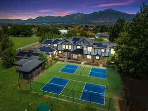 Birds eye view of property with a mountain view