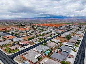 Aerial view of residential area with a mountain backdrop