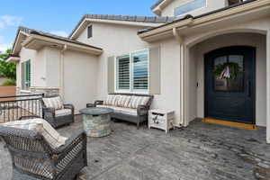 View of patio / terrace featuring an outdoor living space with a fire pit