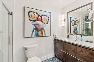 En suite primary bathroom with walk-in shower
