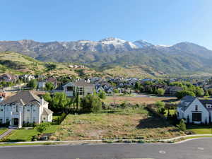 View of mountain background featuring nearby suburban area