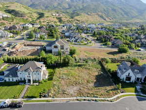 Aerial view of residential area with a mountainous background