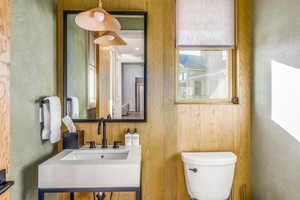 Bathroom featuring a sink and toilet