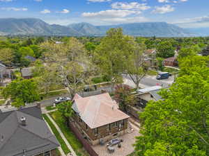 Birds eye view of property featuring a mountain view
