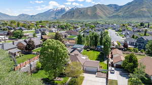 Aerial view of residential area featuring mountains