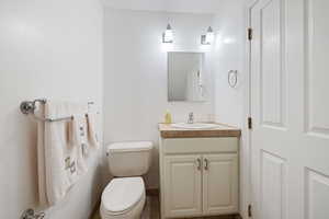 Bathroom with toilet and vanity