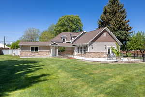 Craftsman inspired home with stone siding and roof with shingles