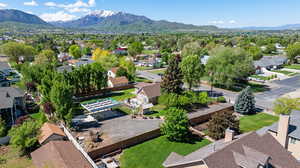 Aerial view of residential area with a mountainous background
