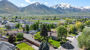 View of mountain background featuring nearby suburban area