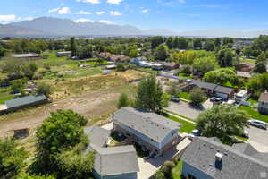 Aerial perspective of suburban area featuring mountains