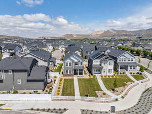 Aerial view of residential area featuring a mountain backdrop
