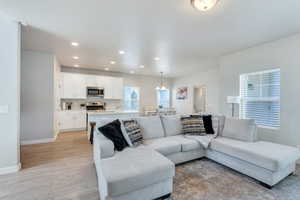 Living room with light LVP flooring