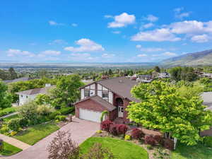 View of subject property with a mountainous background