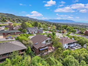 Aerial view of residential area with a mountainous background