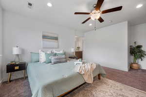 Carpeted bedroom with recessed lighting, baseboards, and ceiling fan
