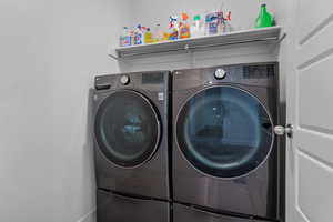 Washroom with washing machine and dryer