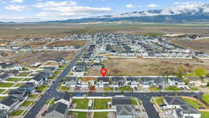 View of property location featuring a mountain backdrop and nearby suburban area