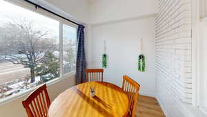 Dining space with wood finished floors