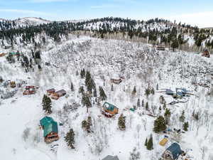 Snowy aerial view with a mountain view