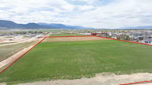 View of yard with a game area and a mountain view