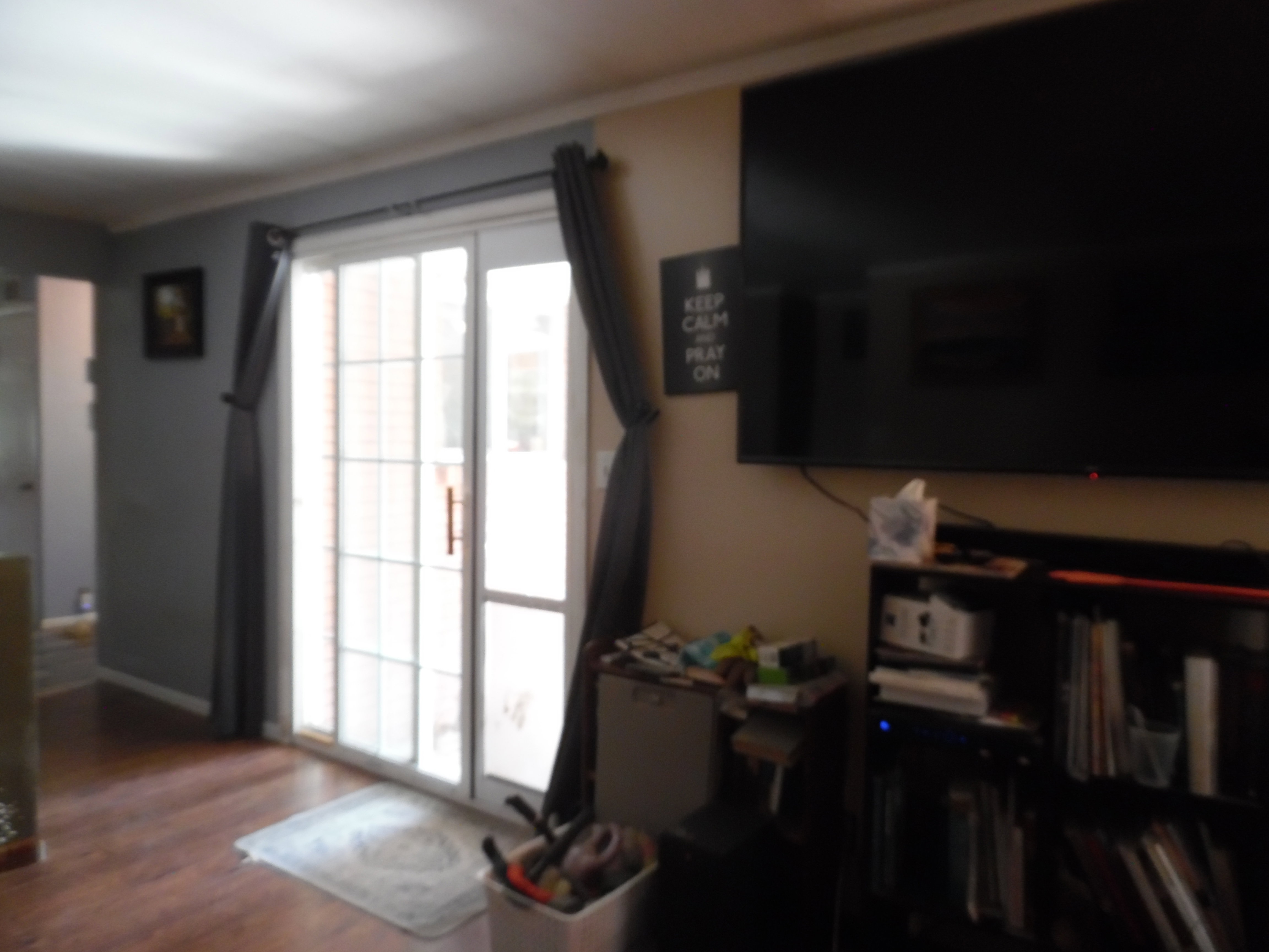 Entryway with wood finished floors and baseboards
