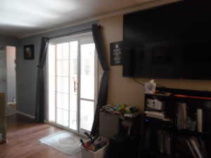 Entryway with wood finished floors and baseboards