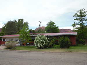 View of front of home with metal roof
