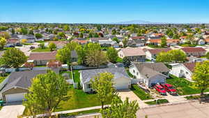 Aerial view featuring a mountain view and a residential view