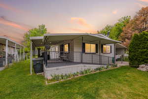 View of front of house featuring a gate