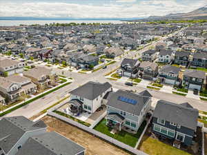 Aerial perspective of suburban area with a mountain backdrop