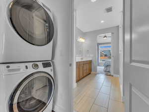 Stacked washer / dryer in primary bedroom closet