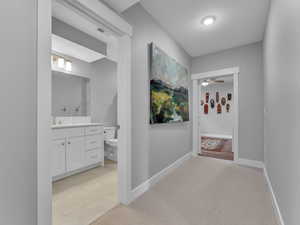Hallway leading to additional bedroom which is currently an office