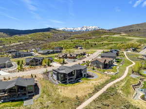 Aerial perspective of suburban area featuring mountains