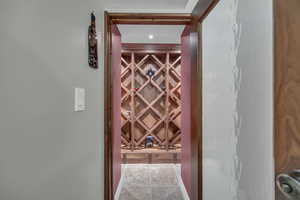 Wine room with stone finish flooring