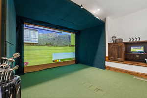 Playroom featuring golf simulator and carpet flooring