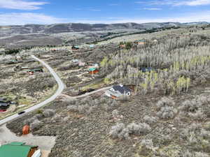 Aerial overview of property's location with mountains