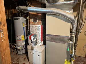 Utilities featuring gas water heater and heating unit