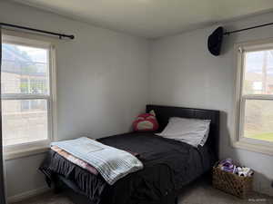 Bedroom featuring carpet floors