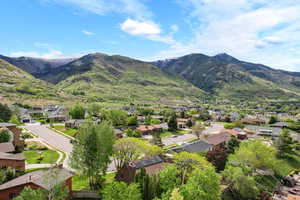 View of mountain backdrop with nearby suburban area