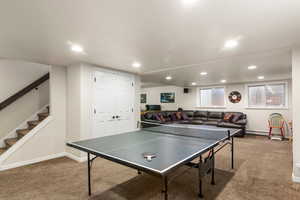 Family room featuring carpet floors, recessed lighting, and baseboards